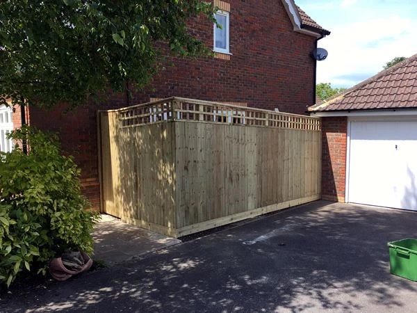Oxford house with close board fencing